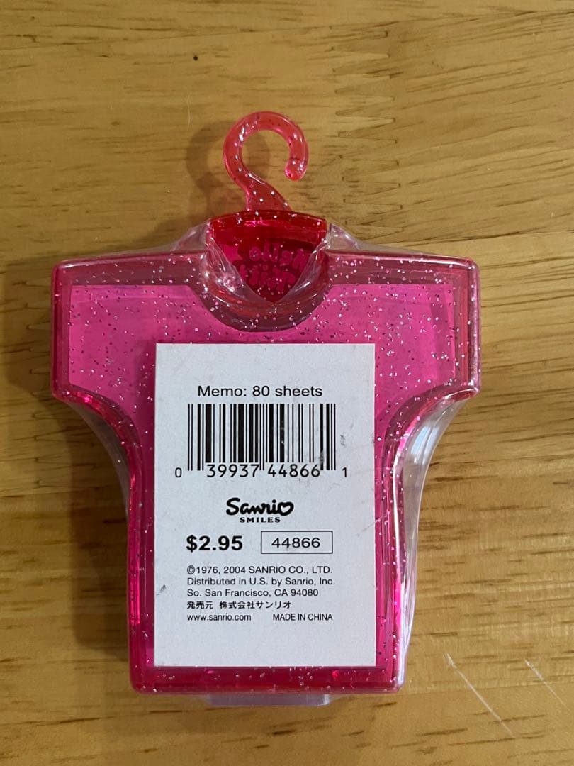 海外サンリオ　ハローキティ ケース入りダイカットメモ　ローラー　80シート