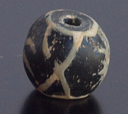 ジャワ発掘、珍しい横向き鳥マニック・ブルン　黒の胎に白で鳥・放射・Ｘ・環モチーフ