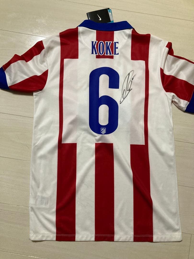 【新品】アトレティコマドリード 14-15ホームユニフォーム6番コケ直筆サイン入