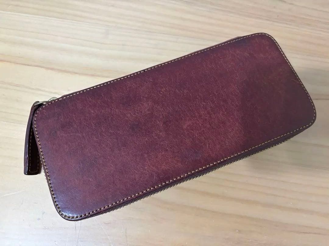 バハギア ラウンドジップペンケース モスト