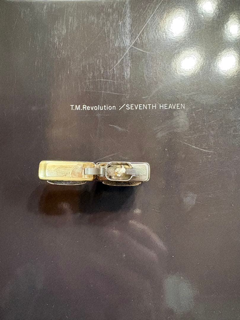 TMレボリューション写真集とジッポライター