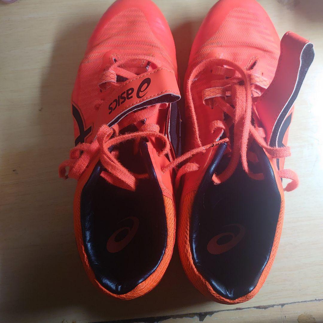 ASICS スパイクシューズ オレンジ