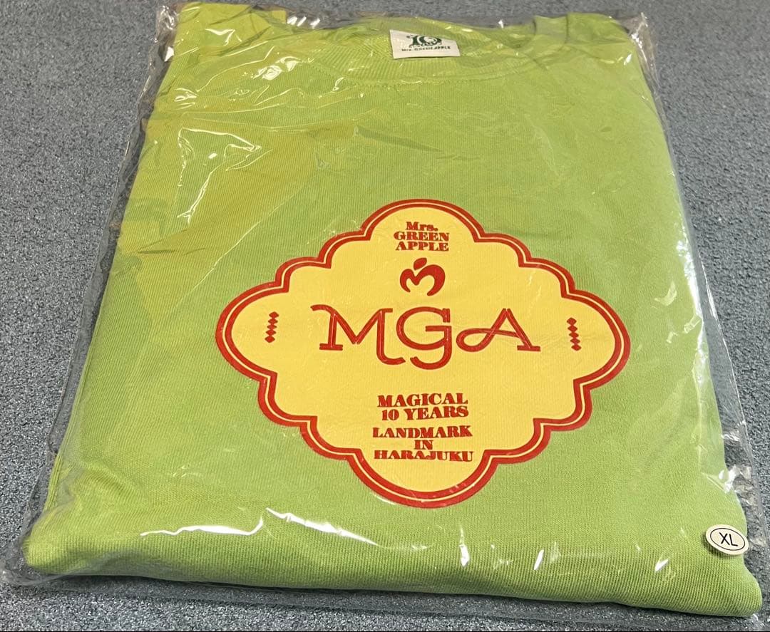 MGAマジカル10イヤーランドマークin原宿クルーネックプルオーバーグリーンXL