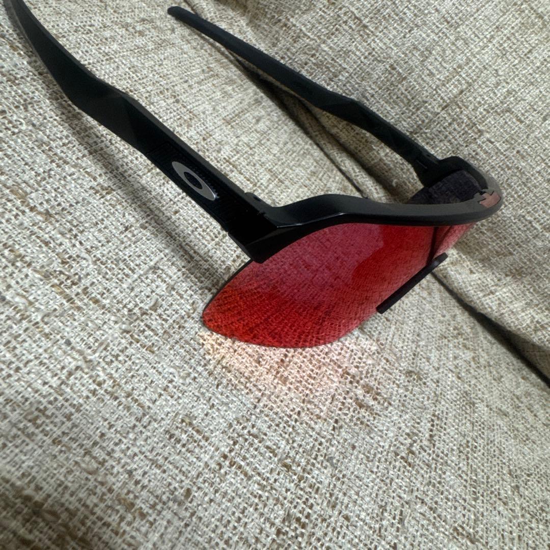 Oakley スポーツサングラス 赤レンズ 黒フレーム
