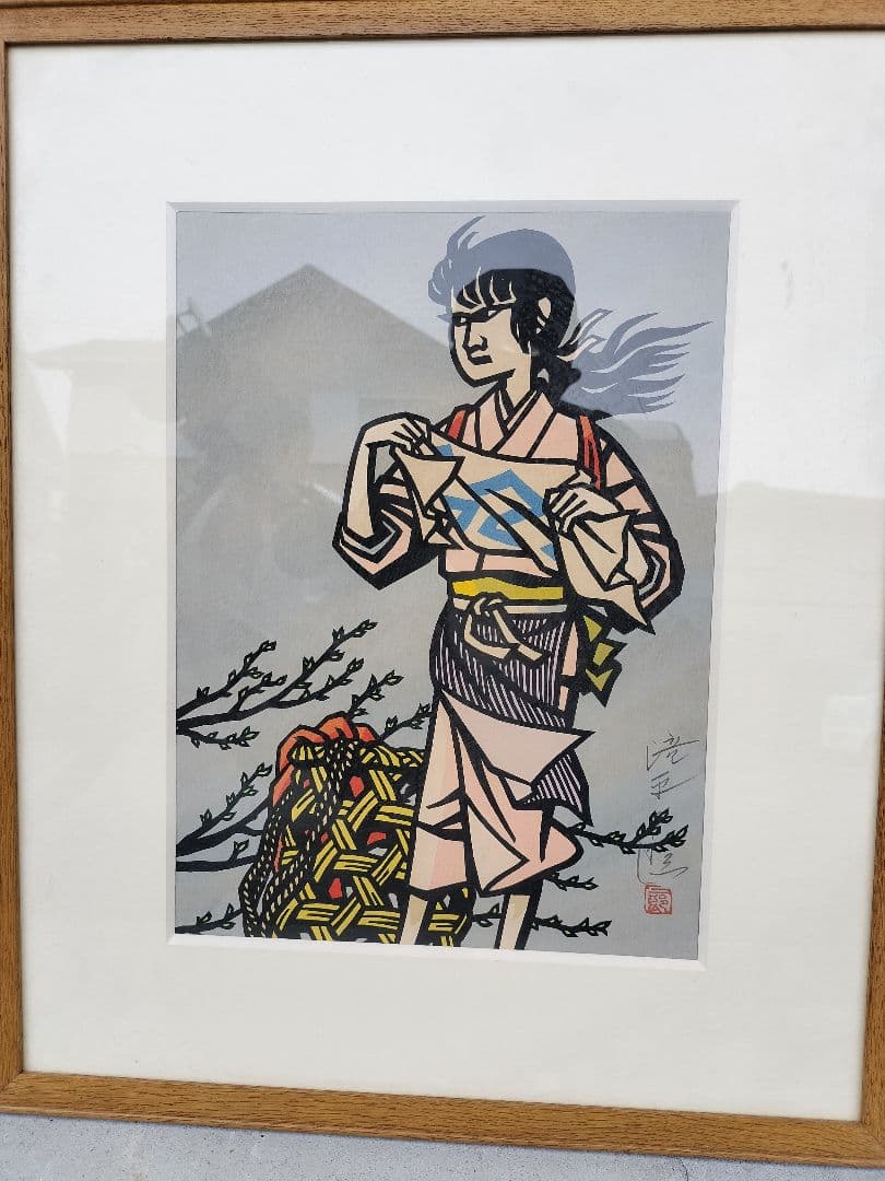 木版画 女性と荷物