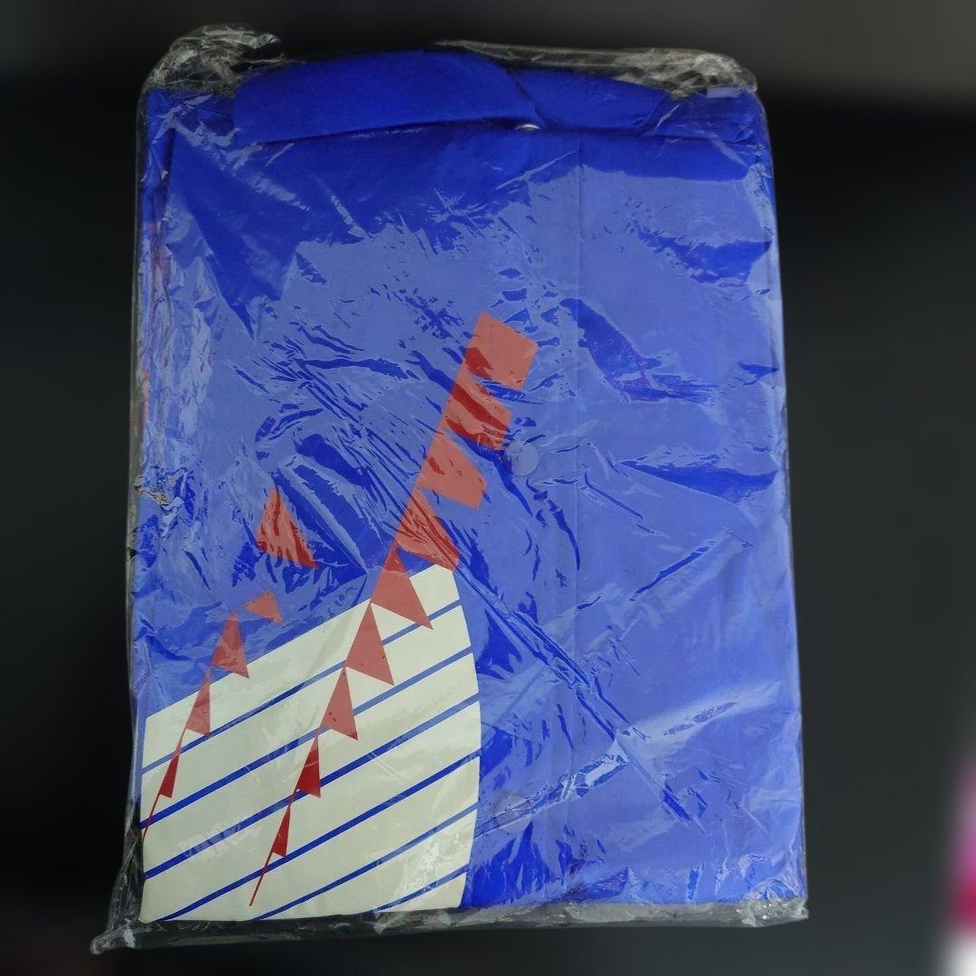 JFAエンブレム付き青色ノベルティポンチョ