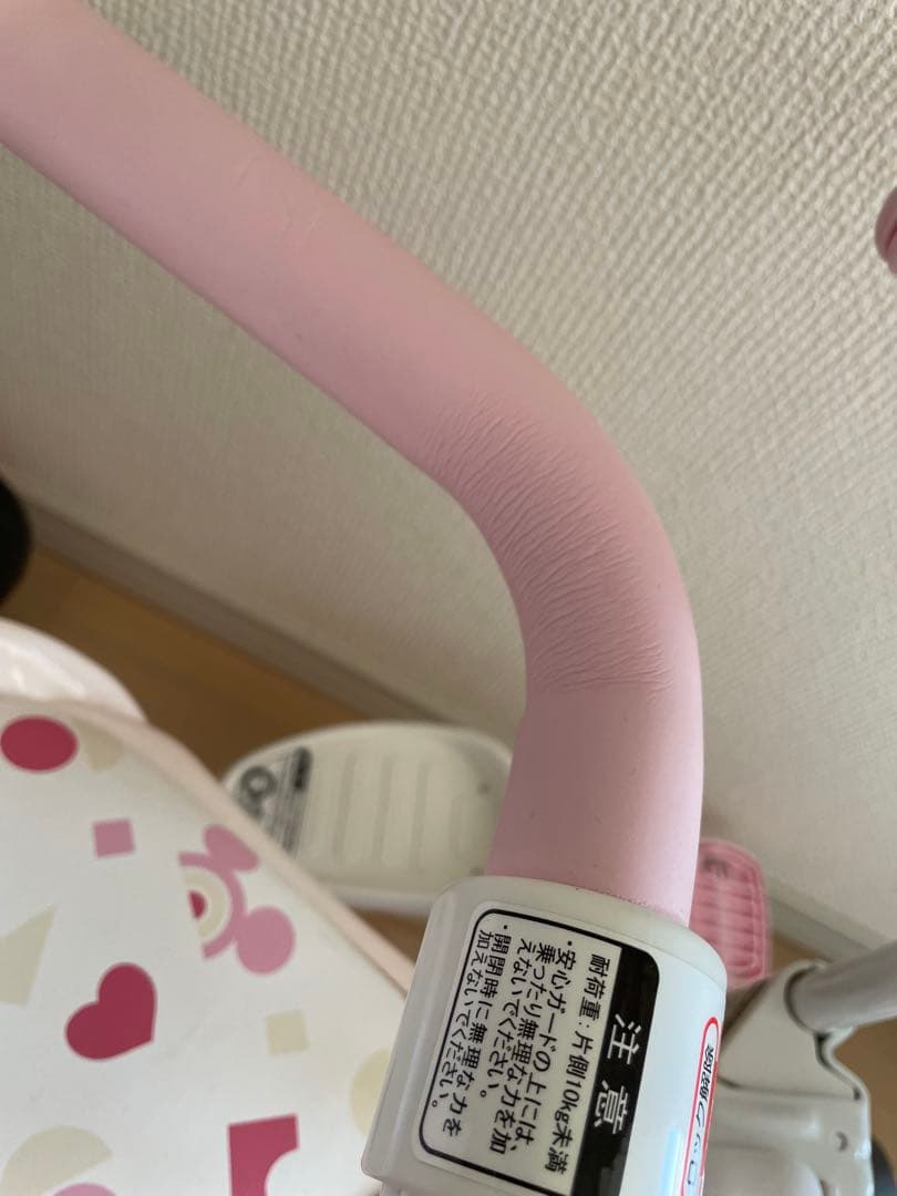 ピンクの三輪車 後ろハンドル付き