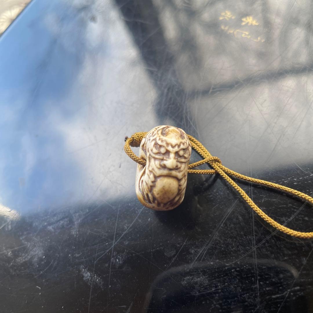 提げ物　緒締　玉龍　鹿角？