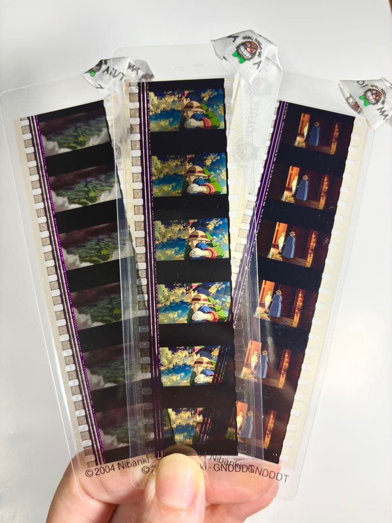 【終了間近！ハウルの動く城、新品】フィルムブックマーカー３枚&トランプ&フィルム