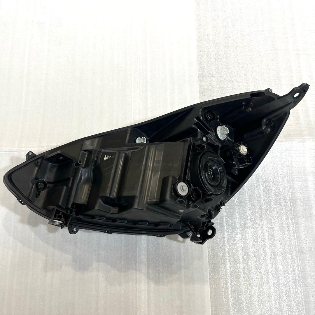 フィット 純正ヘッドライト右 GR1