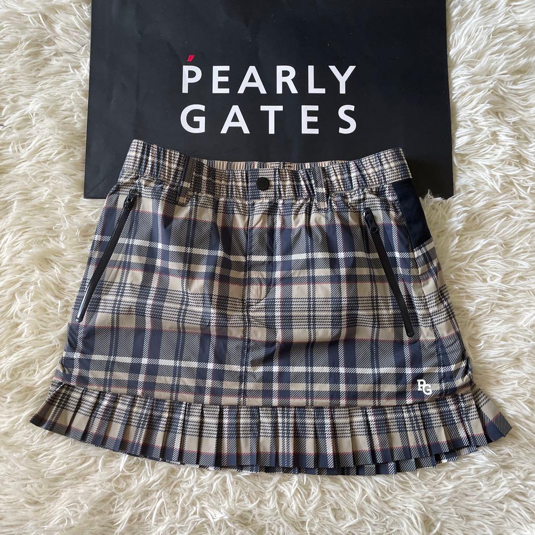 パーリーゲイツ 【軽量保温】バックロゴプリーツ切替タフタスカートサイズ0