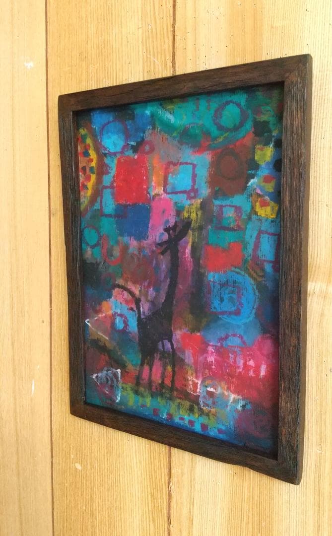 カラフルなキリンのパステル画