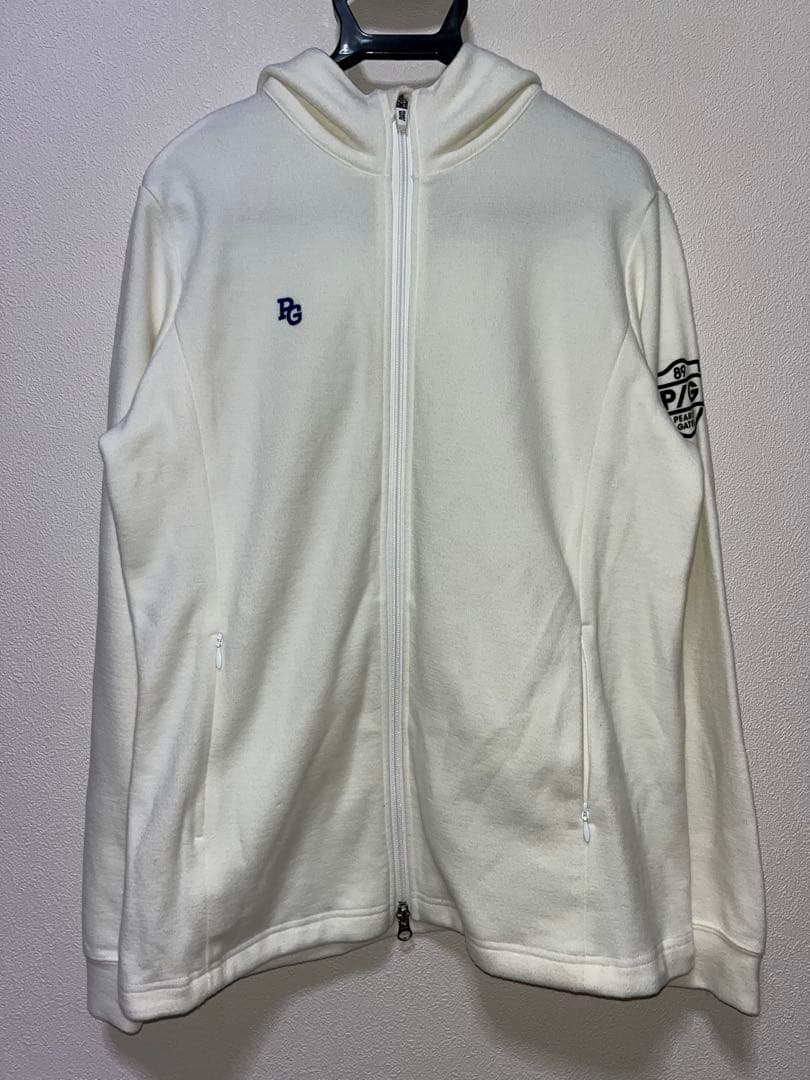 パーリーゲイツ　ホワイト　白　パーカー　ニット　ロゴ　絞り　ジップ