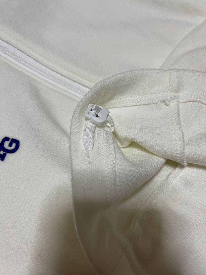 パーリーゲイツ　ホワイト　白　パーカー　ニット　ロゴ　絞り　ジップ