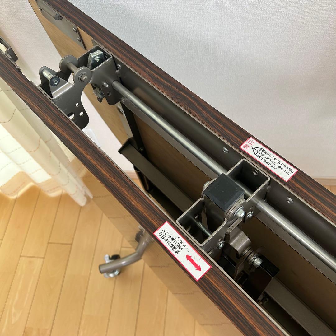 フライト式円型テーブル　折りたたみテーブル　直径120cm 丸テーブルキャスター