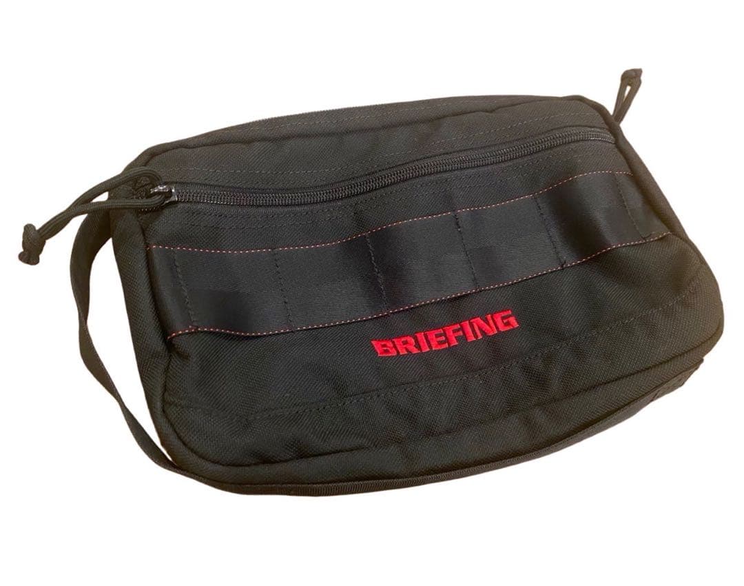 BRIEFING ラウンドポーチ