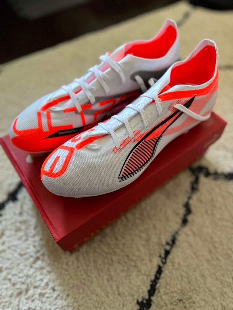 PUMAプーマ ウルトラ 5 マッチ HG/AG(ホワイト×オレンジ)
