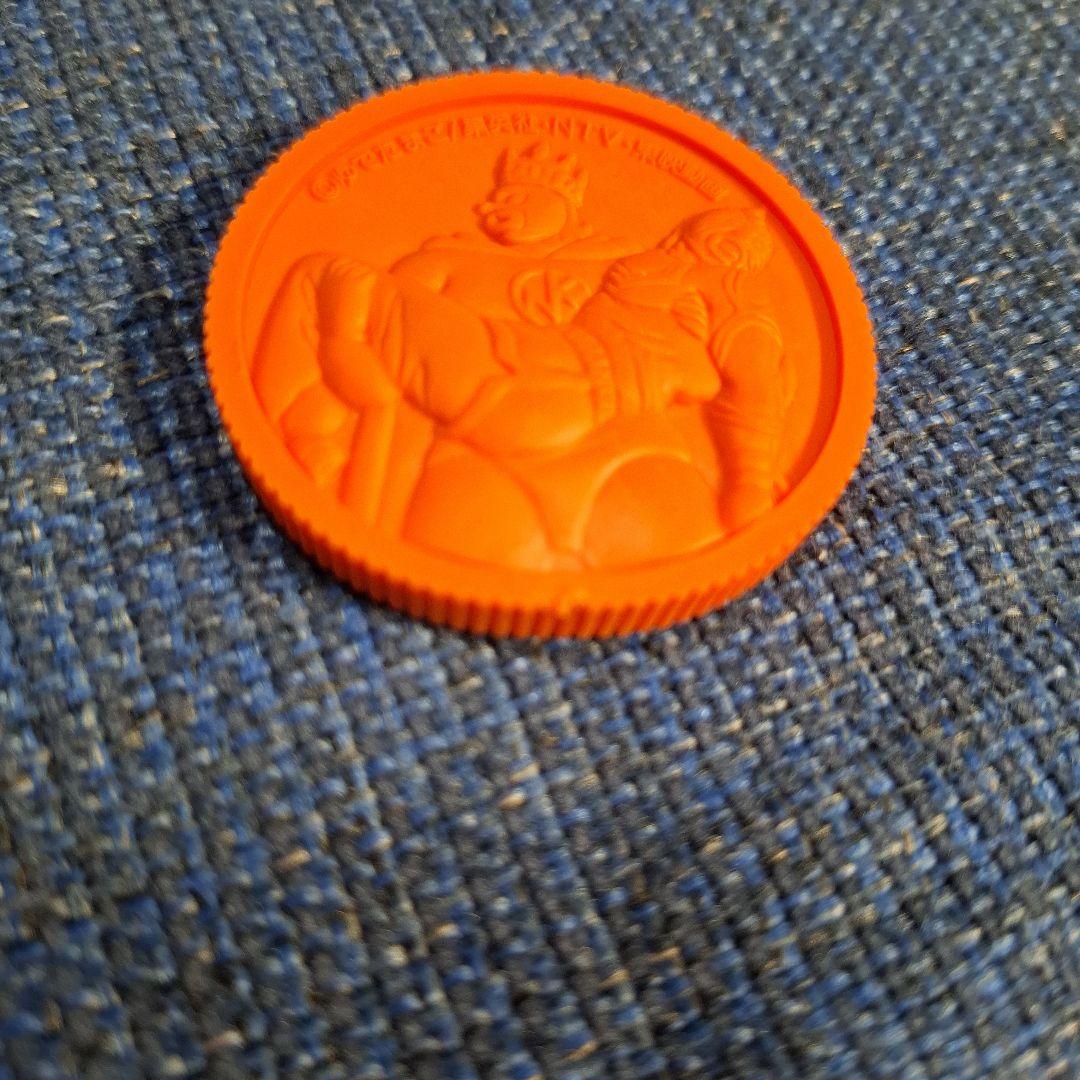 キン肉マン 記念メダル オレンジ色 消しゴム
