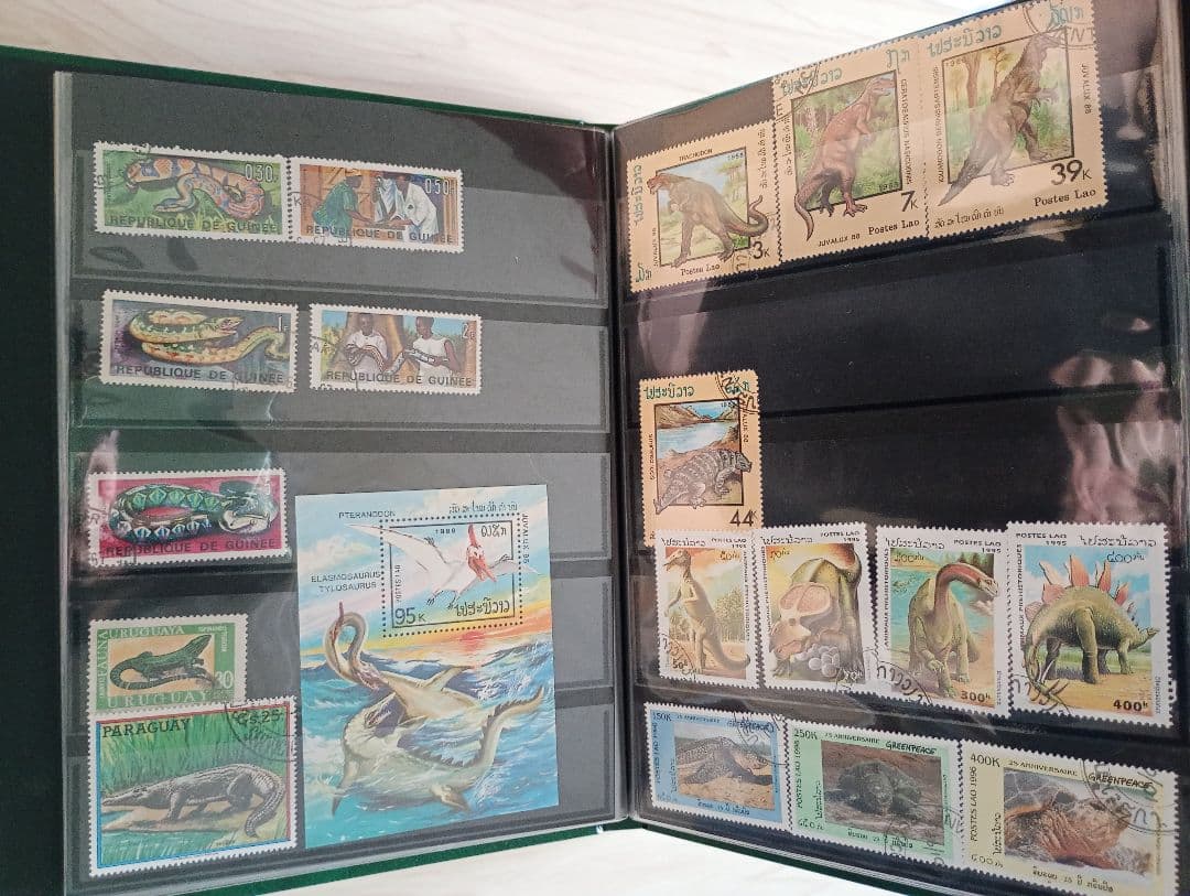 希少31まで限定出品！手彫竜銭ヘビ爬虫類トカゲ　テージー切手アルバムまとめ売り