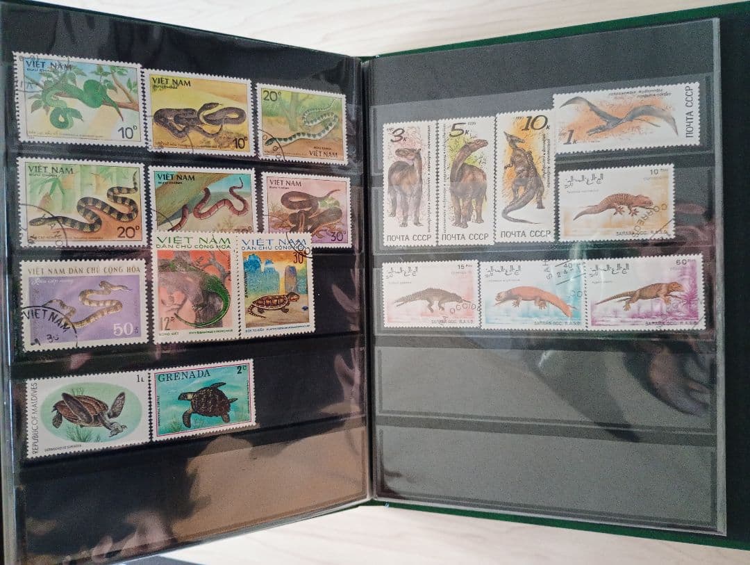 希少31まで限定出品！手彫竜銭ヘビ爬虫類トカゲ　テージー切手アルバムまとめ売り