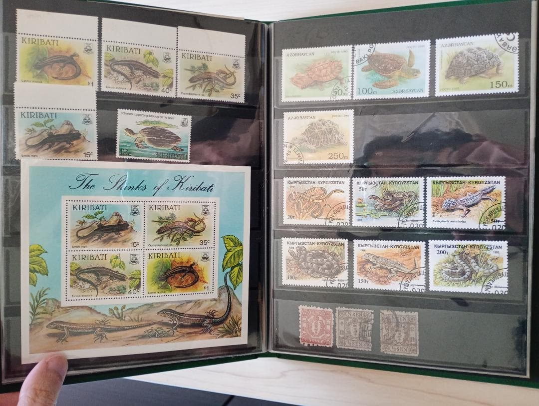 希少31まで限定出品！手彫竜銭ヘビ爬虫類トカゲ　テージー切手アルバムまとめ売り