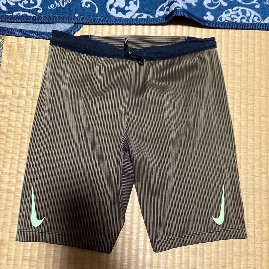 Nike 蛍光イエロー タンクトップ