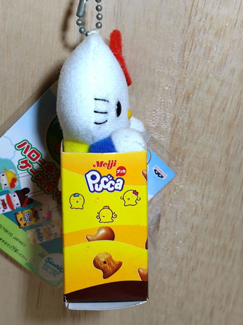超激レア☆ハローキティ+明治製菓　プッカ　ケース付マスコット　2003年