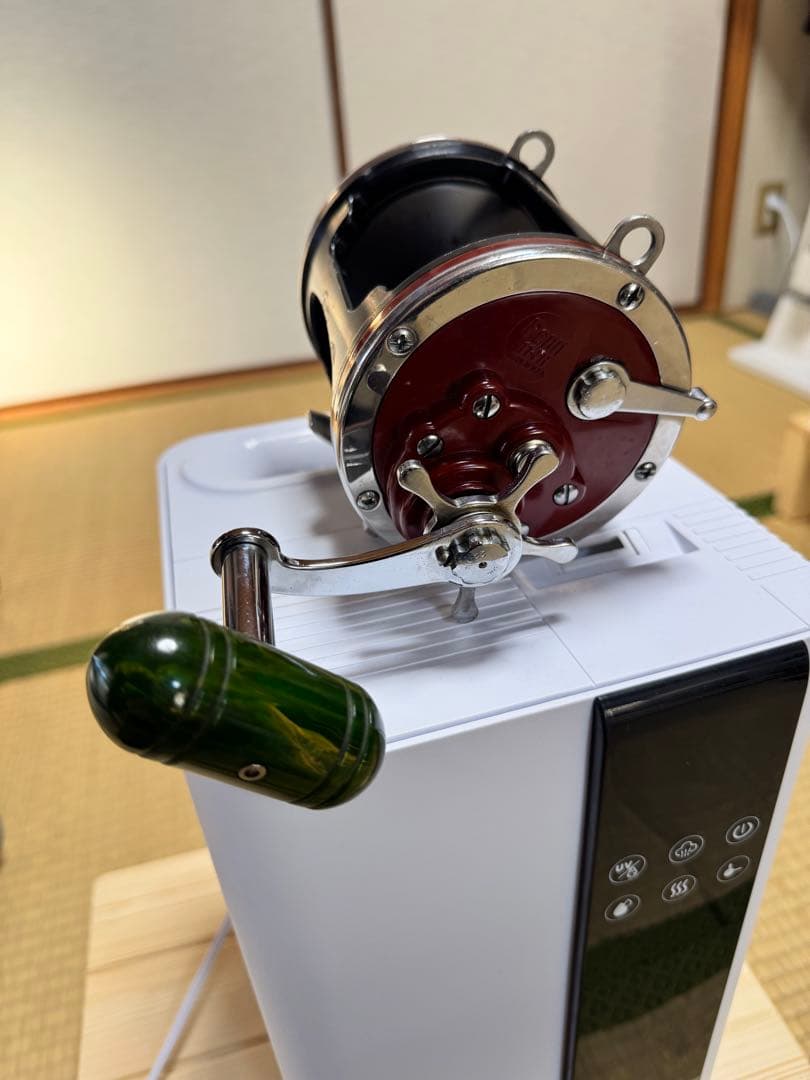 ダイワ幻覇王クエ！ 竿受け、リール60付けます。