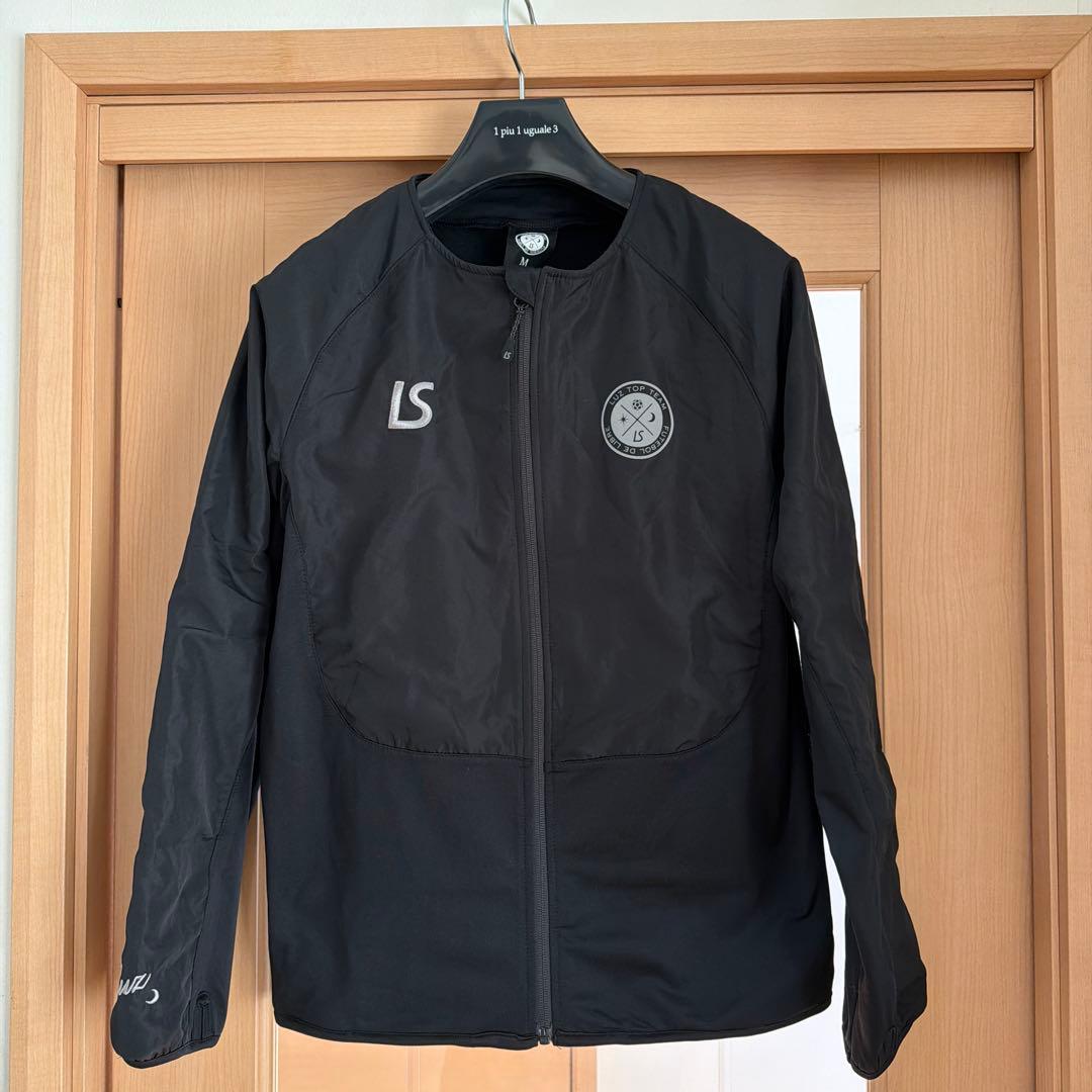 LS ブラックノーカラージャケット Luz Top Team