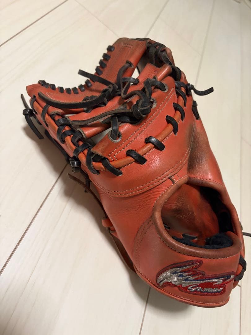 オレンジ革製野球グローブ