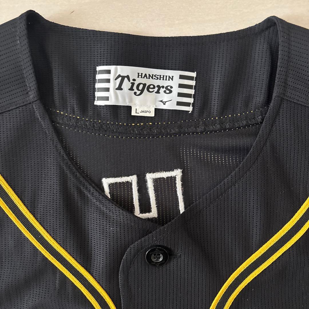 阪神タイガース　レプリカユニフォームＬ＆リストバンド（共に未使用に近い）