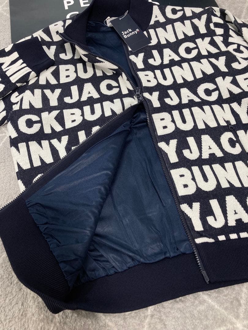 新品 パーリーゲイツ ジャックバニー ロゴジャガード防風裏地ブルゾン(5)L/紺