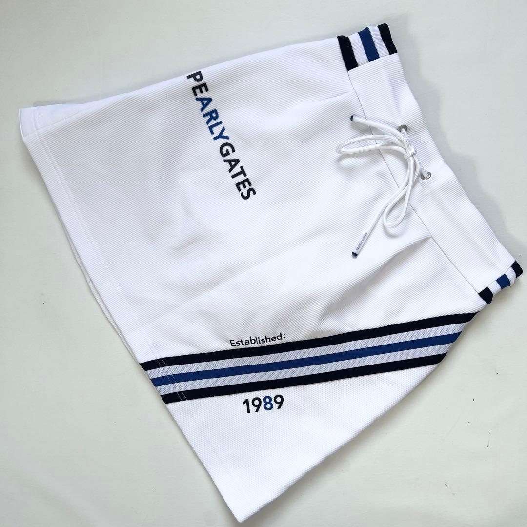 パーリーゲイツ　セットアップ　白×青　ポロシャツ　スカート　ゴルフ　総柄　ロゴ