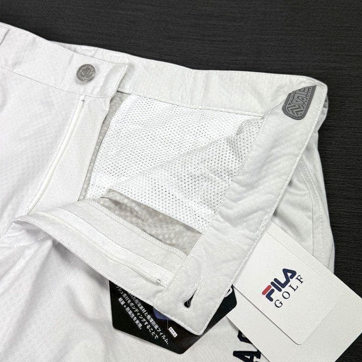 新品フィラ ゴルフ 上下セット 4WAYストレッチ ライトボンディング 白 LL