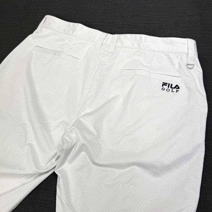 新品フィラ ゴルフ 上下セット 4WAYストレッチ ライトボンディング 白 LL