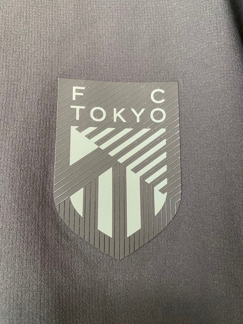 2025 FC東京×ニューバランス　ブラックアウトTシャツ　ウーブンショーツ　Ｌ