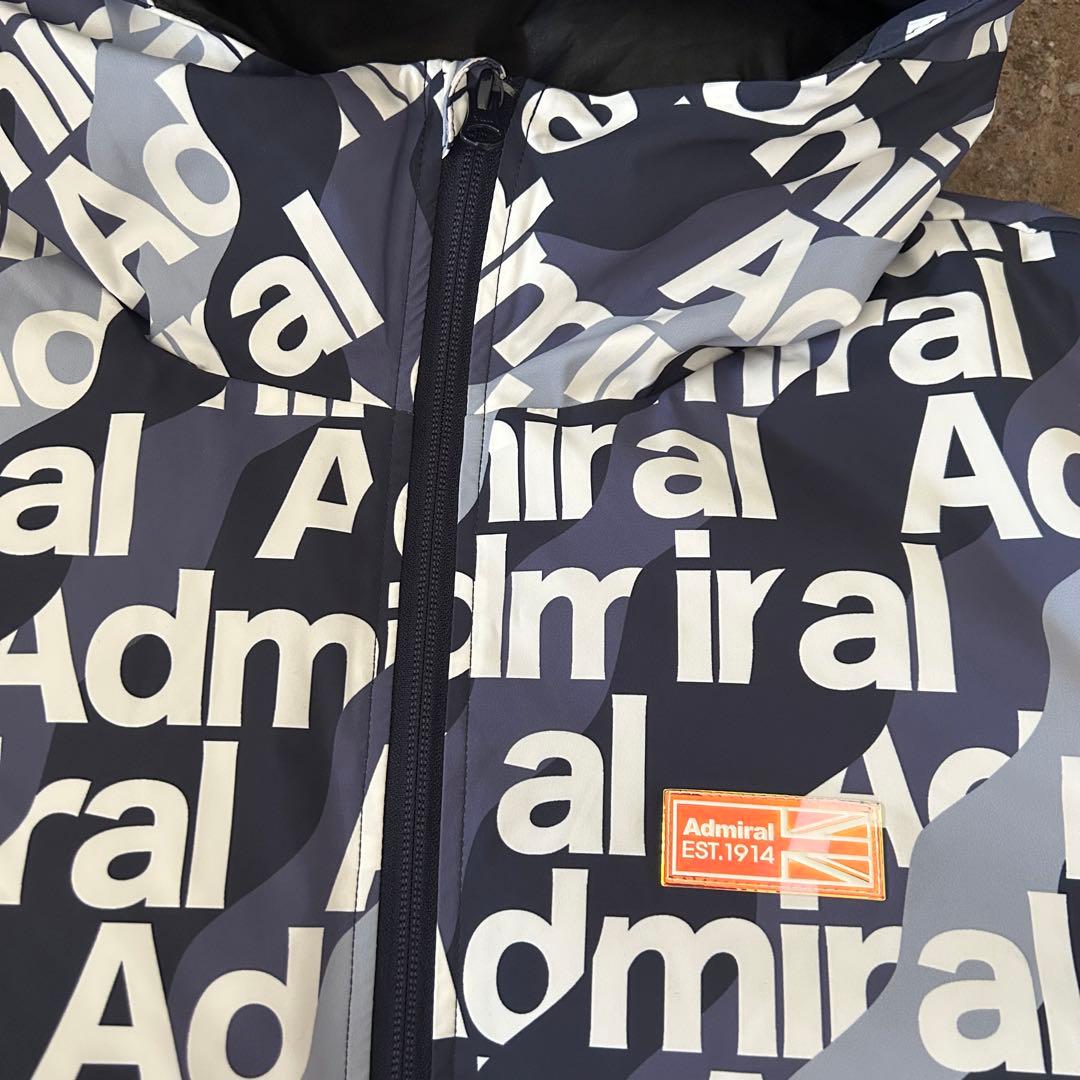 ADMIRAL GOLF ボトムロゴ 軽量パデッド　フーデッドジャケット　総柄