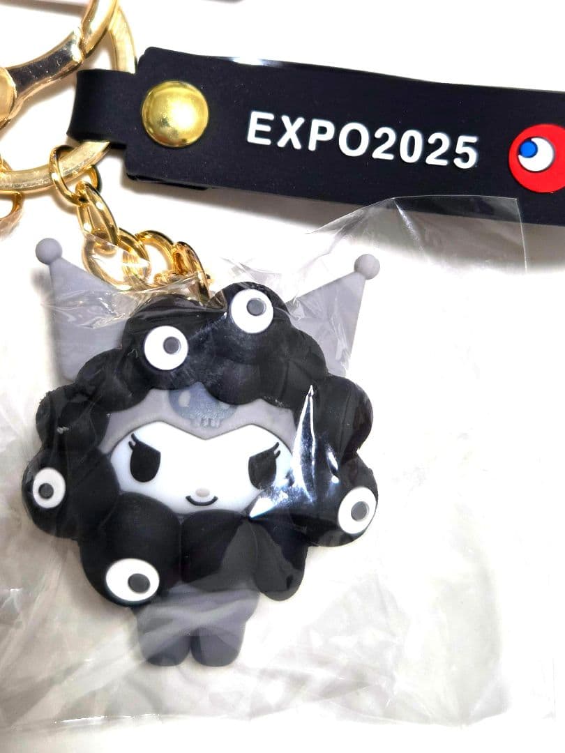【万博会場内限定タグ付】 ４種類サンリオ黒ミャクミャクなりきりキーホルダーセット