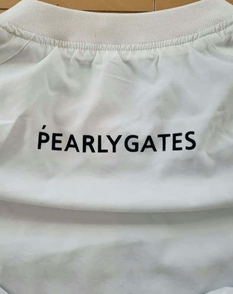 パーリーゲイツ スニード 白×ネイビー 蓄熱裏地 フロントロゴメンズ 6(XL)