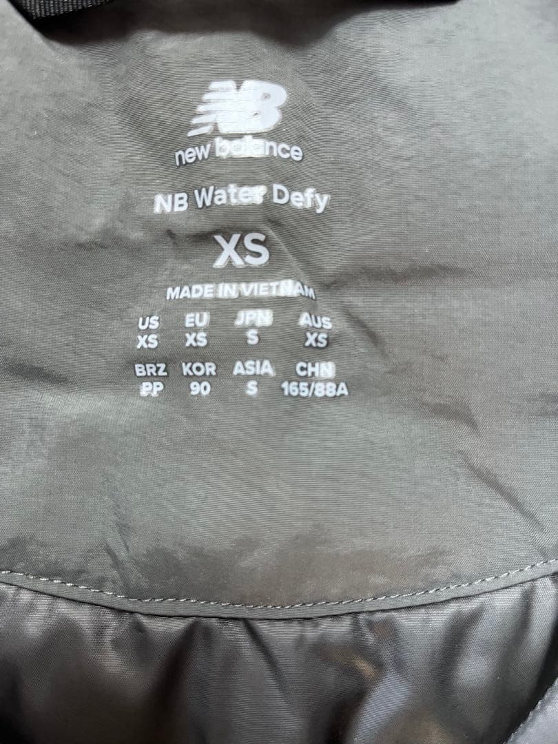 [ニューバランス] メンズ コーチパーカ サイズＳ（162-170日本サイズM)