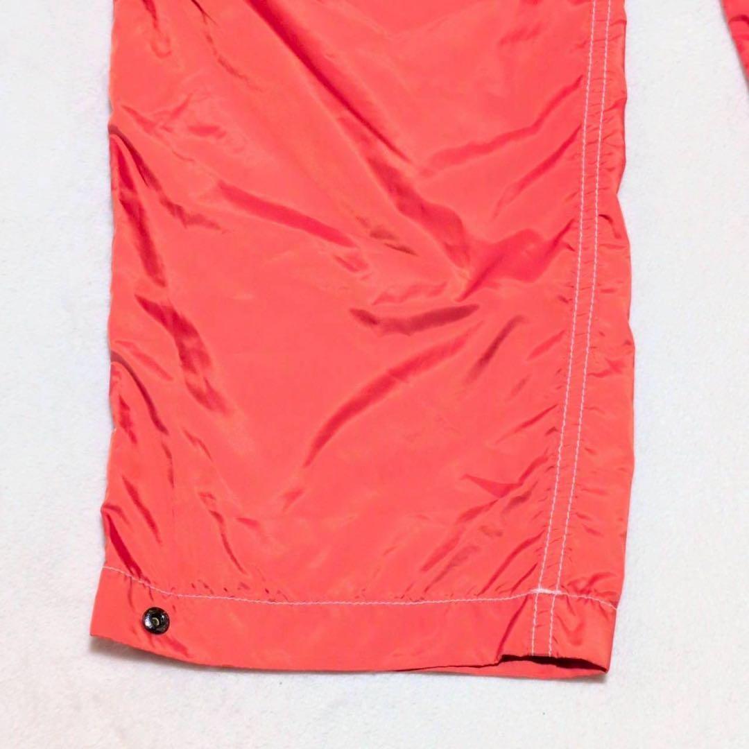 【rough & swell】ナイロン ゴルフパンツ ウエスト調整 オレンジ L