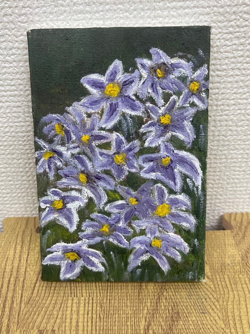 紫と黄色の花の油彩画