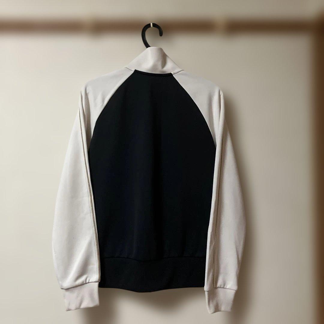 ELLESSE ジャージセットアップ ブラック パンツバックロゴ刺繍レディースＭ