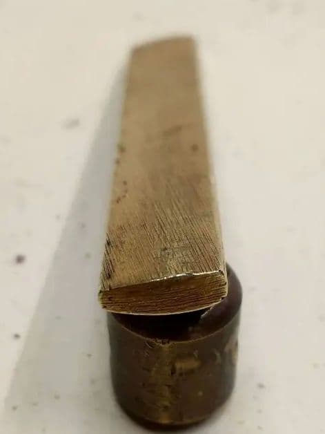 小柄袋、、赤銅魚子地に獅子図