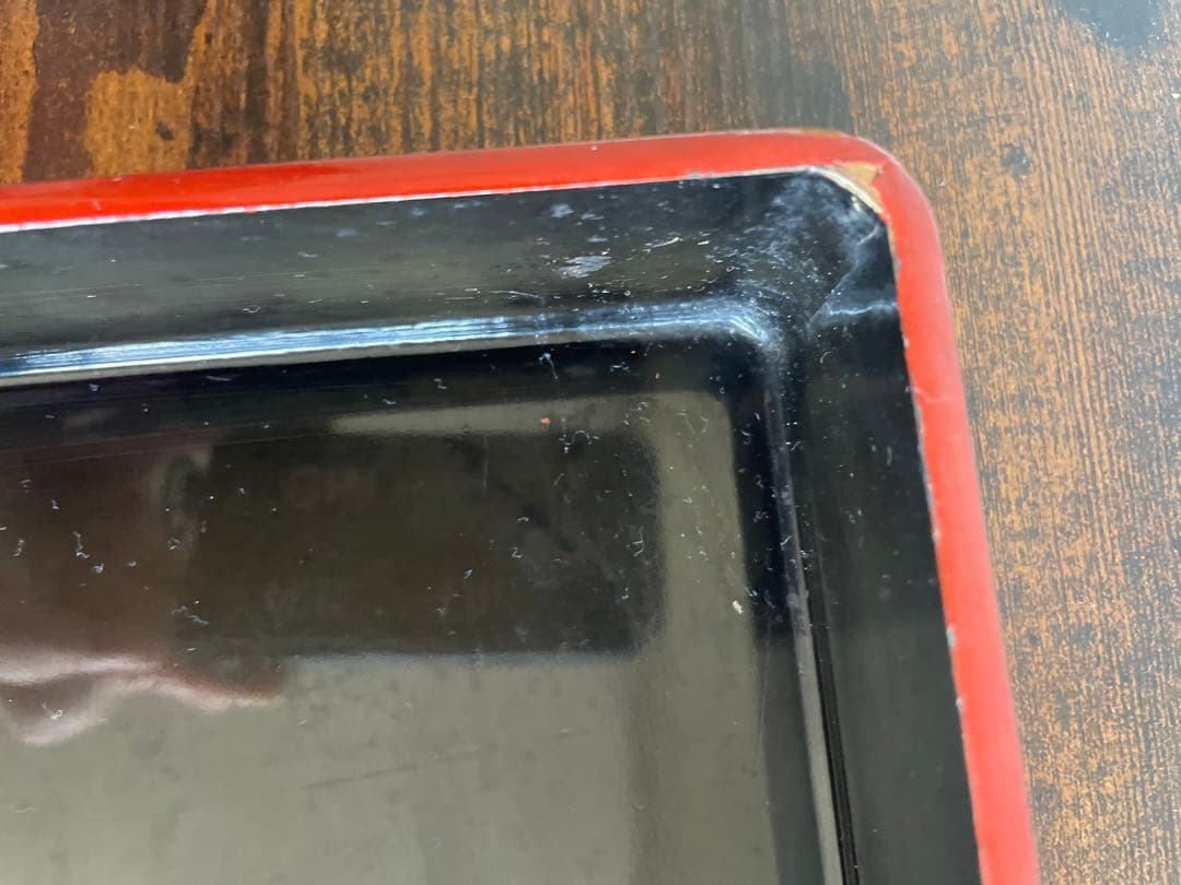 扇形装飾の赤い重箱