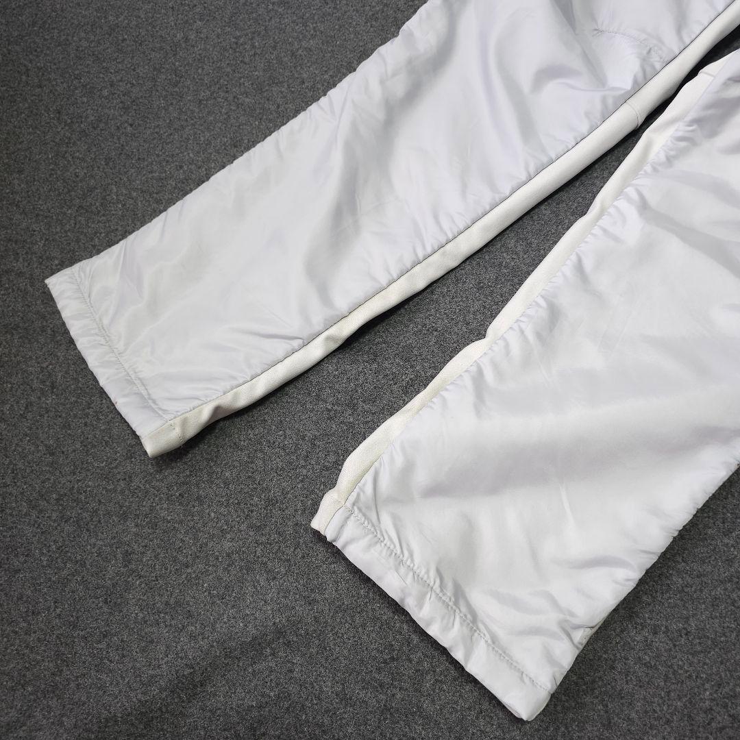 美品 アンパスィ ダンボールニット 中綿ストレッチゴルフパンツ LL