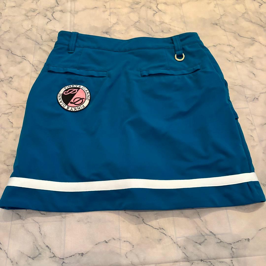 PINKY GOLF ターコイズ ラップスカートとモックシャツ