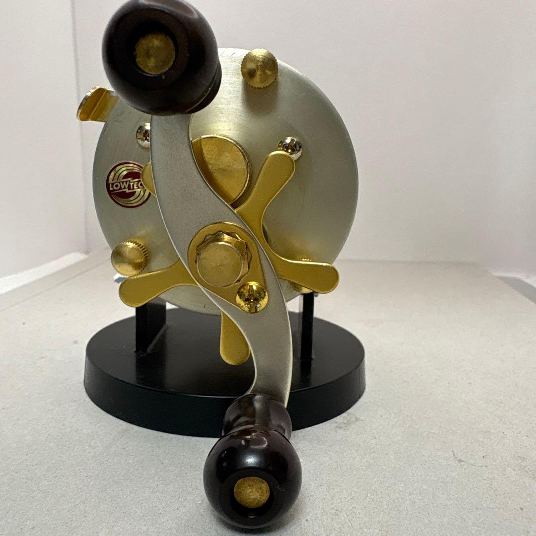 道楽マツモトーイＡ-20ベイトリール ゴールド/シルバー 収納袋付き