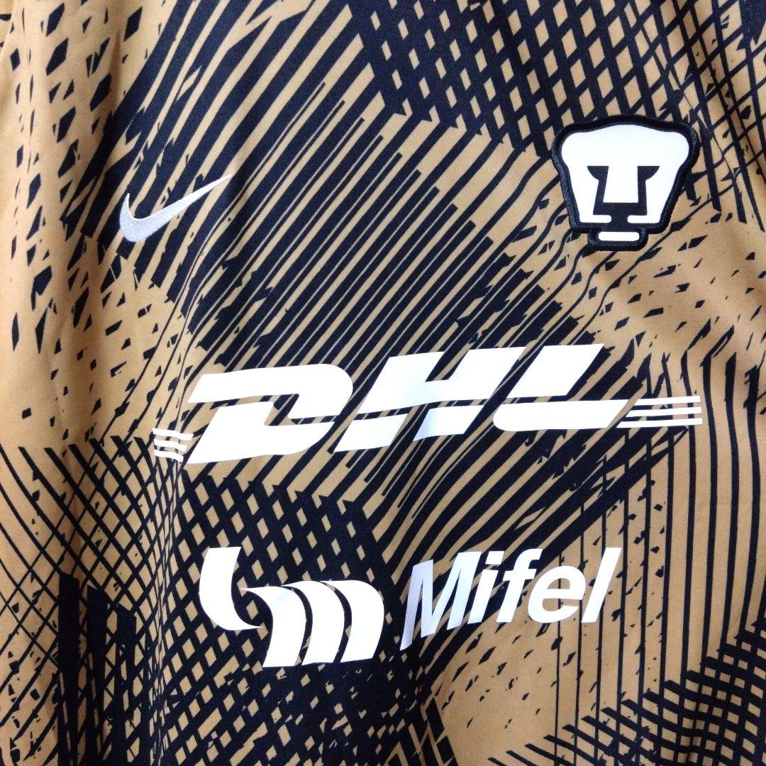 ウェア NIKE PUMAS UNAM PRE MATCH JERSEY