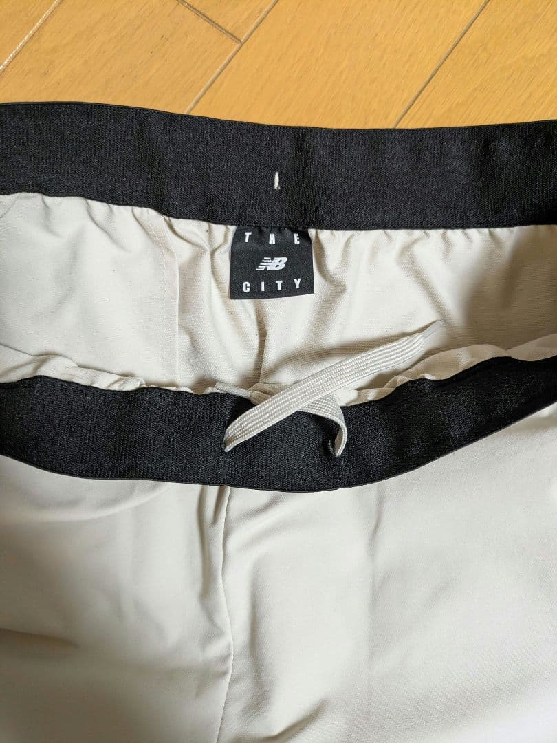 最終値下げニューバランス　THE CITY ウーブンパーカーパンツ上下セット S